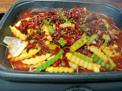 萬州香辣烤魚技術培訓價格多少錢？成都飄味緣小吃培訓班比較便宜